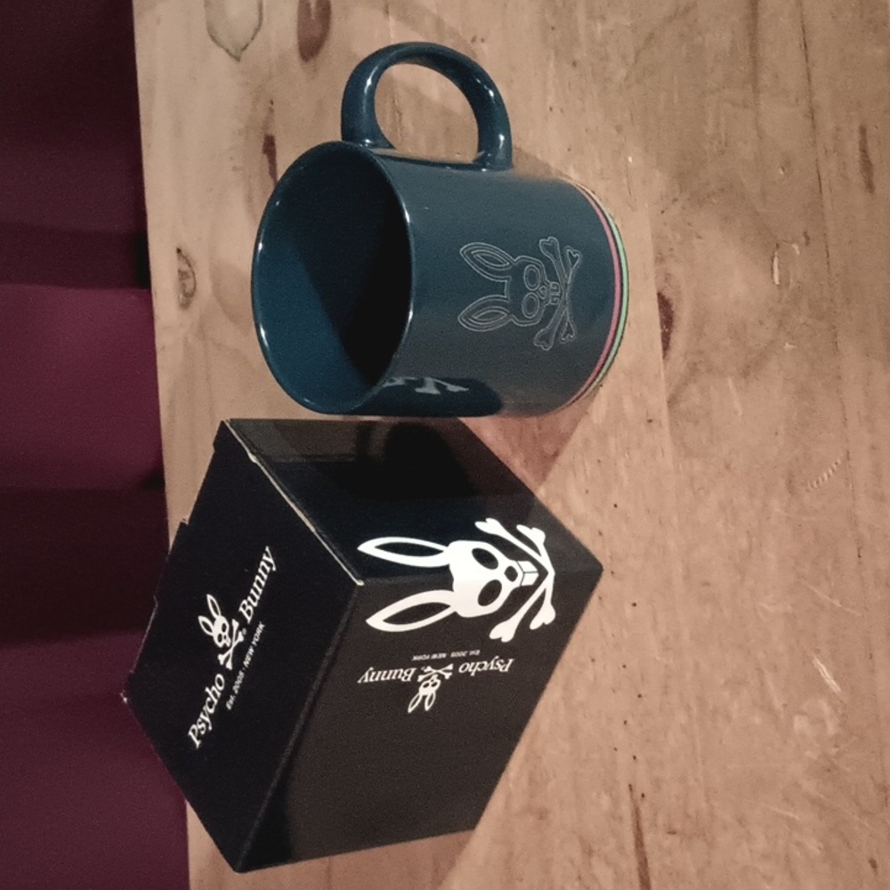 Psycho Bunny coffee mug.